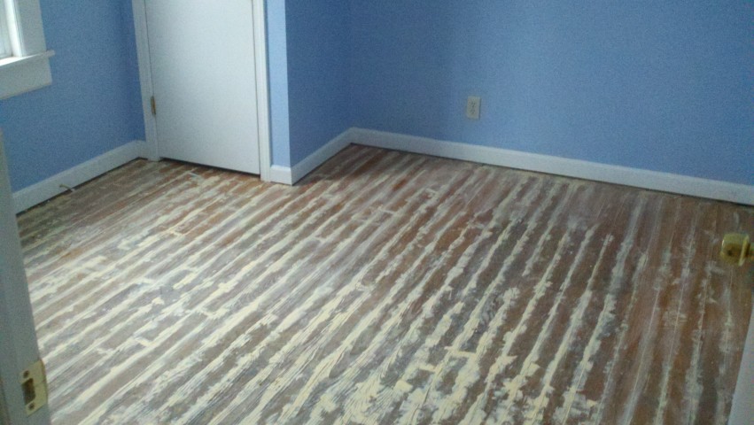 scraped up and damaged hardwood floor
