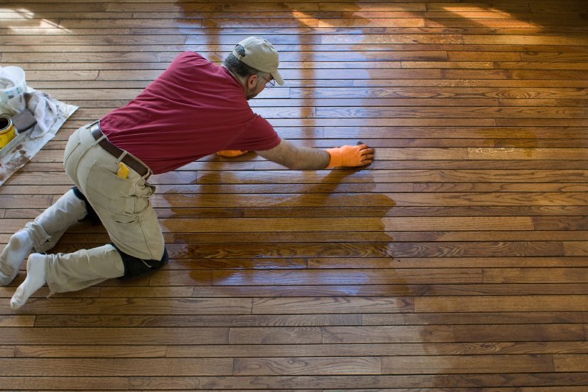 a fabulous floors technicians refinishing a milwaukee floor
